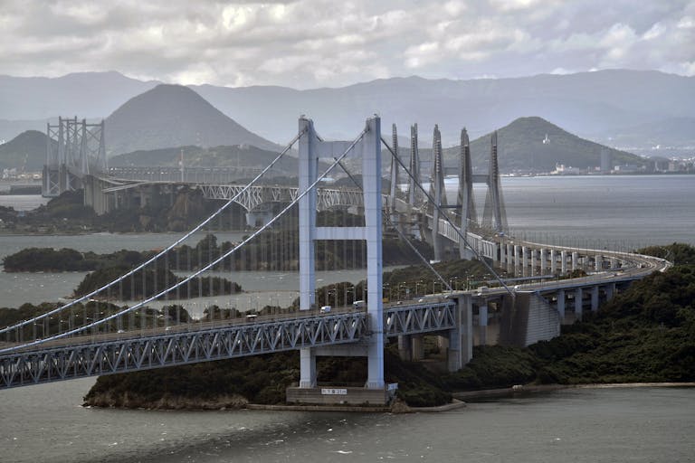 A stunning aerial view of the Great Seto Bridge connecting Kagawa and Okayama in Japan.